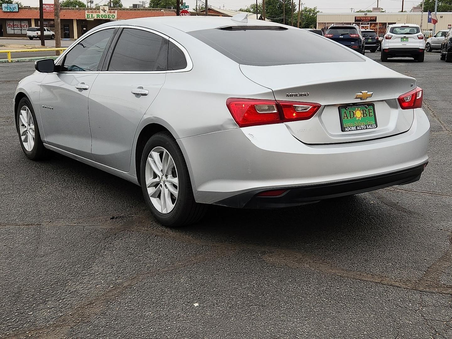 2018 SILVER /Jet Black - H1T Chevrolet Malibu LT (1G1ZD5ST7JF) with an ECOTEC 1.5L I-4 gasoline direct injection, DOHC, VVT variable valve control, intercooled turbo, regular unleaded, engine with 160HP engine, located at 4711 Ave Q, Lubbock, TX, 79412, (806) 687-2362, 33.551304, -101.855293 - Photo#2