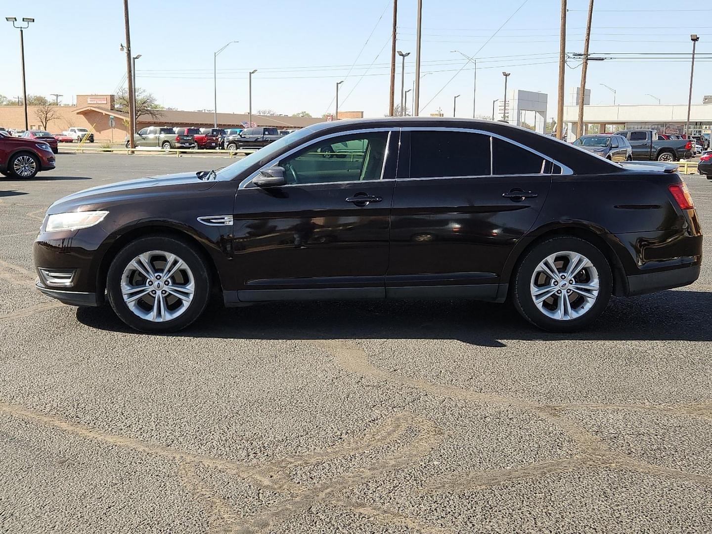 2013 BLACK /Charcoal Black - MW Ford Taurus SEL (1FAHP2E86DG) with an 3.5L Ti-VCT V6 Flex Fuel Engine engine, located at 4711 Ave Q, Lubbock, TX, 79412, (806) 687-2362, 33.551304, -101.855293 - Photo#1