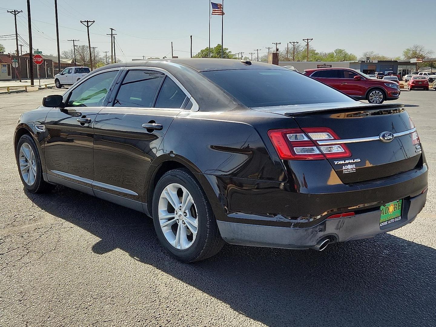 2013 BLACK /Charcoal Black - MW Ford Taurus SEL (1FAHP2E86DG) with an 3.5L Ti-VCT V6 Flex Fuel Engine engine, located at 4711 Ave Q, Lubbock, TX, 79412, (806) 687-2362, 33.551304, -101.855293 - Photo#2
