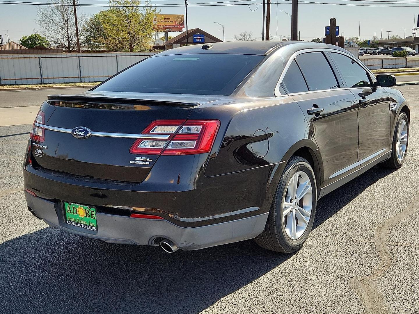 2013 BLACK /Charcoal Black - MW Ford Taurus SEL (1FAHP2E86DG) with an 3.5L Ti-VCT V6 Flex Fuel Engine engine, located at 4711 Ave Q, Lubbock, TX, 79412, (806) 687-2362, 33.551304, -101.855293 - Photo#3