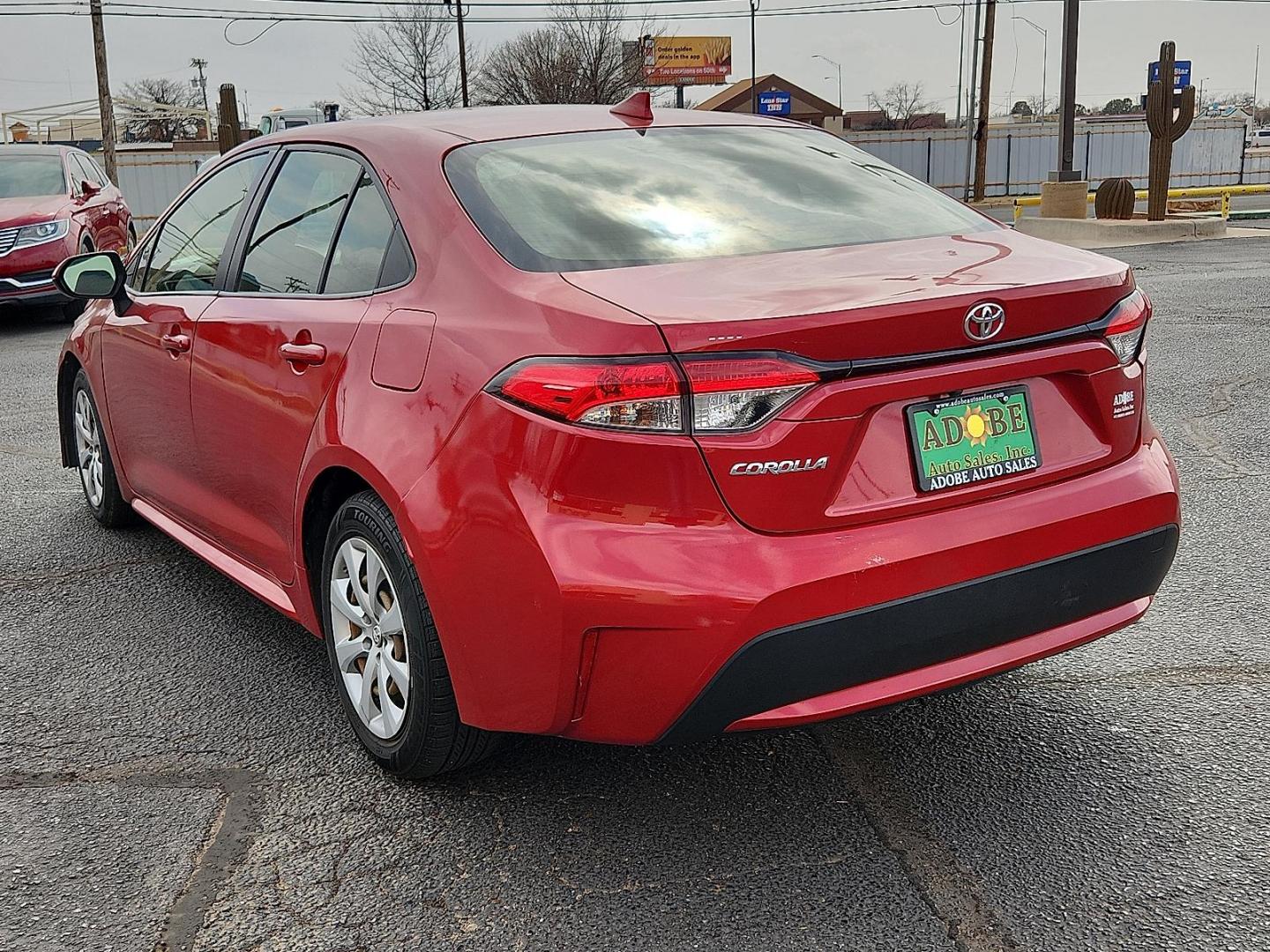 2021 RED /Grey Toyota Corolla LE (JTDEPMAE8MJ) with an 1.8L I-4 DOHC, VVT-i variable valve control, regular unleaded, engine with 139HP engine, located at 4711 Ave Q, Lubbock, TX, 79412, (806) 687-2362, 33.551304, -101.855293 - Photo#2