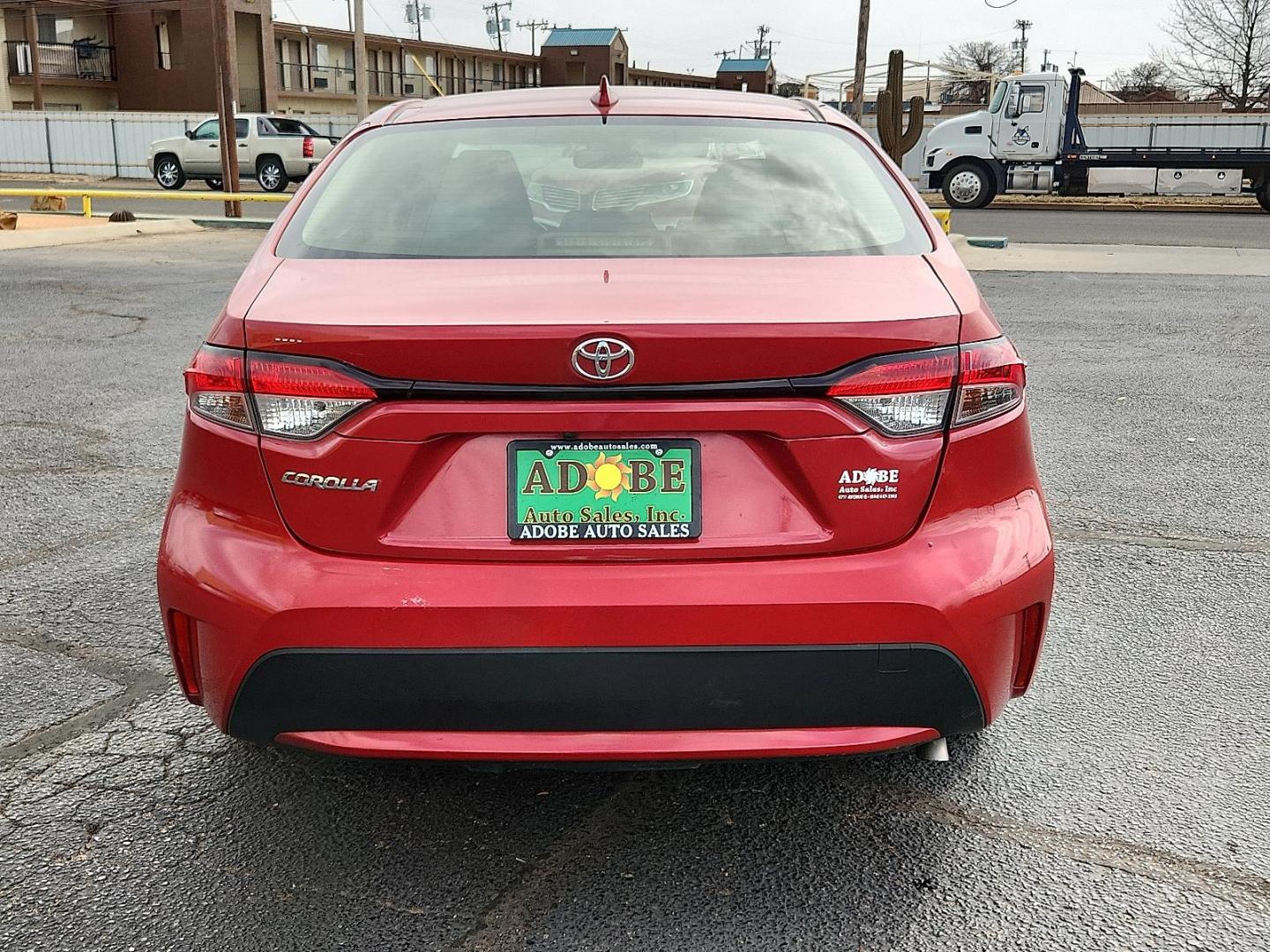 2021 RED /Grey Toyota Corolla LE (JTDEPMAE8MJ) with an 1.8L I-4 DOHC, VVT-i variable valve control, regular unleaded, engine with 139HP engine, located at 4711 Ave Q, Lubbock, TX, 79412, (806) 687-2362, 33.551304, -101.855293 - Photo#3