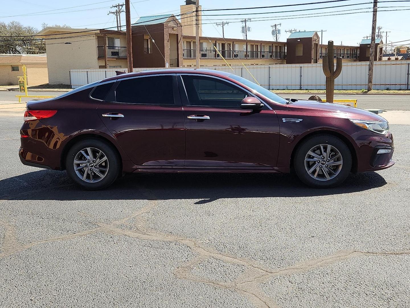 2020 PURPLE /Black - WK Kia Optima LX (5XXGT4L39LG) with an Theta II 2.4L I-4 gasoline direct injection, DOHC, D-CVVT variable valve control, regular unleaded, engine with 185HP engine, located at 4711 Ave Q, Lubbock, TX, 79412, (806) 687-2362, 33.551304, -101.855293 - Photo#4