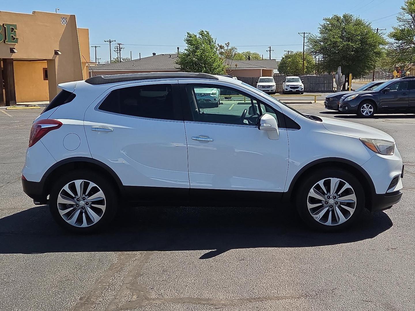 2017 Summit White - GAZ /Ebony - AFN Buick Encore Preferred (KL4CJASBXHB) with an Ecotec 1.4L I-4 DOHC, variable valve control, intercooled turbo, regular unleaded, engine with 138HP engine, located at 4711 Ave Q, Lubbock, TX, 79412, (806) 687-2362, 33.551304, -101.855293 - Photo#5