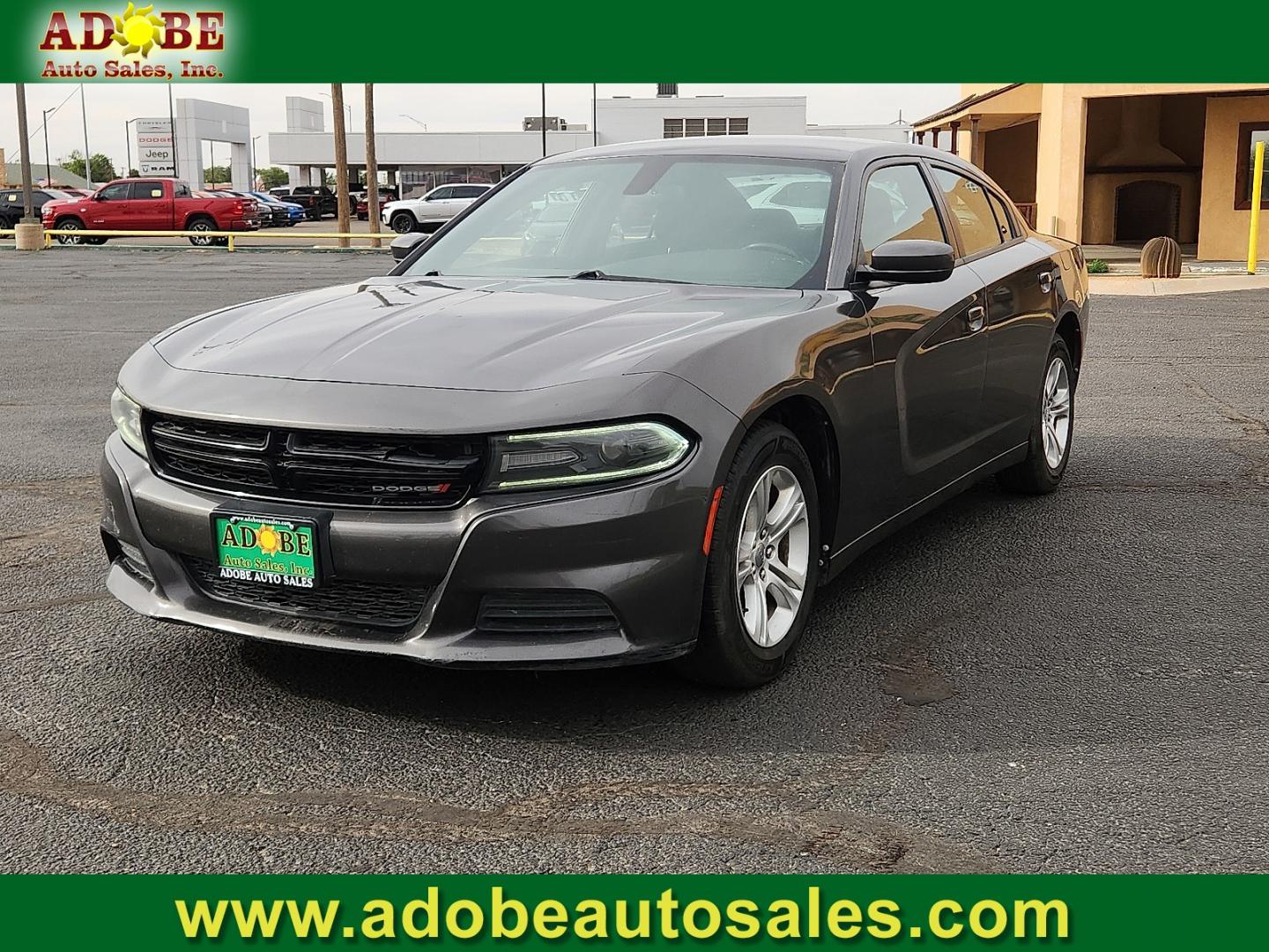 2019 GRAY Dodge Charger SXT (2C3CDXBG9KH) with an Pentastar 3.6L V-6 DOHC, variable valve control, regular unleaded, engine with 292HP engine, located at 4711 Ave Q, Lubbock, TX, 79412, (806) 687-2362, 33.551304, -101.855293 - Photo#0
