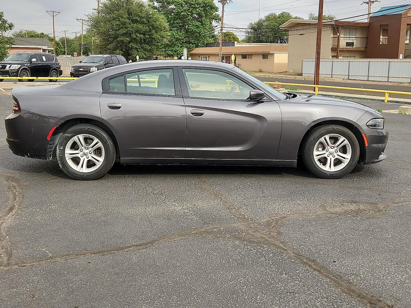 2019 GRAY Dodge Charger SXT (2C3CDXBG9KH) with an Pentastar 3.6L V-6 DOHC, variable valve control, regular unleaded, engine with 292HP engine, located at 4711 Ave Q, Lubbock, TX, 79412, (806) 687-2362, 33.551304, -101.855293 - Photo#4