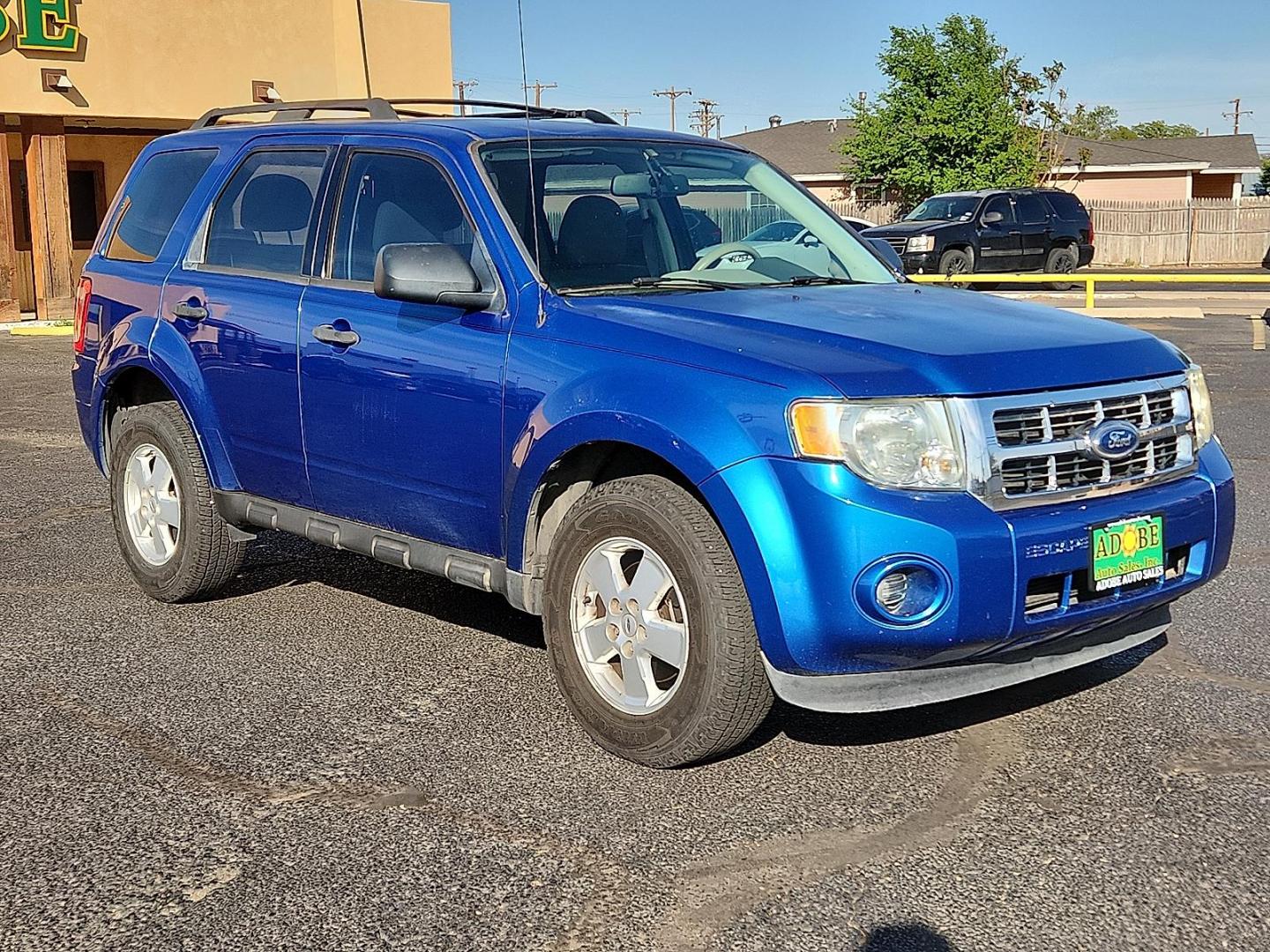 2012 BLUE /Stone - 1S Ford Escape XLS (1FMCU0C77CK) with an Duratec 2.5L I-4 DOHC, variable valve control, regular unleaded, engine with 171HP engine, located at 4711 Ave Q, Lubbock, TX, 79412, (806) 687-2362, 33.551304, -101.855293 - Photo#5