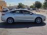 2017 White Gold - GN /Medium Light Stone - DQ Ford Fusion SE (3FA6P0HD9HR) with an EcoBoost 1.5L I-4 gasoline direct injection, DOHC, Ti-VCT variable valve control, intercooled turbo, regular unleaded, engine with 181HP engine, located at 4711 Ave Q, Lubbock, TX, 79412, (806) 687-2362, 33.551304, -101.855293 - Photo#5