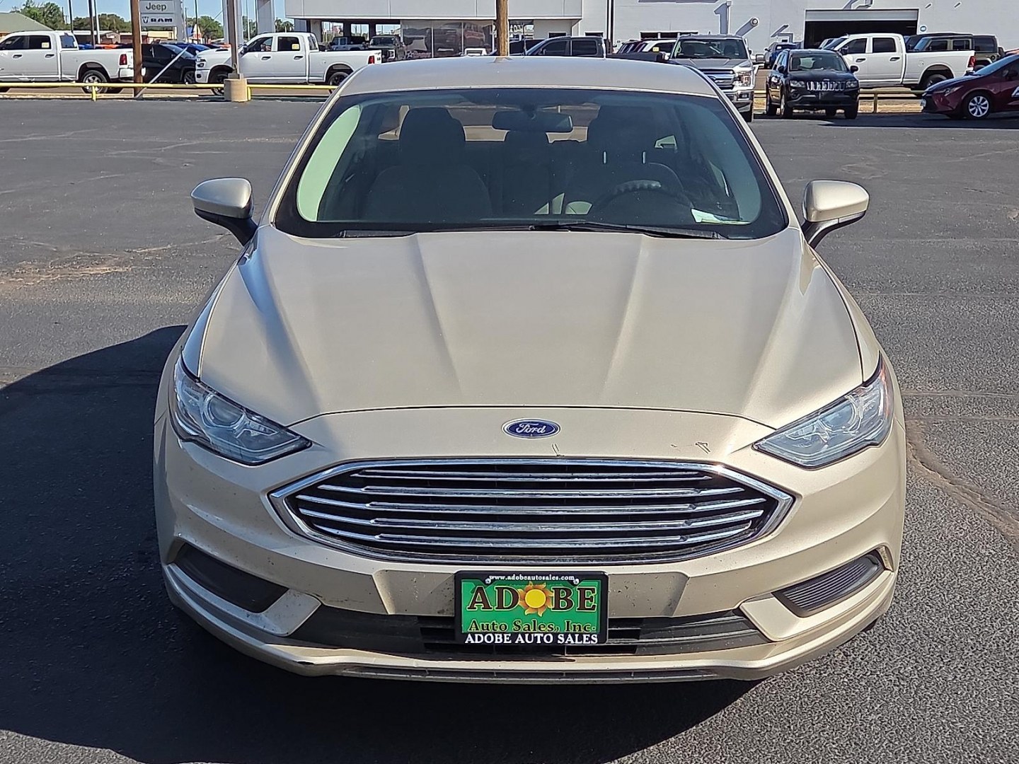 2017 White Gold - GN /Medium Light Stone - DQ Ford Fusion SE (3FA6P0HD9HR) with an EcoBoost 1.5L I-4 gasoline direct injection, DOHC, Ti-VCT variable valve control, intercooled turbo, regular unleaded, engine with 181HP engine, located at 4711 Ave Q, Lubbock, TX, 79412, (806) 687-2362, 33.551304, -101.855293 - Photo#7