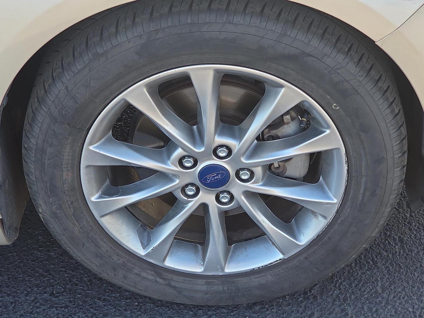 2017 White Gold - GN /Medium Light Stone - DQ Ford Fusion SE (3FA6P0HD9HR) with an EcoBoost 1.5L I-4 gasoline direct injection, DOHC, Ti-VCT variable valve control, intercooled turbo, regular unleaded, engine with 181HP engine, located at 4711 Ave Q, Lubbock, TX, 79412, (806) 687-2362, 33.551304, -101.855293 - Photo#8