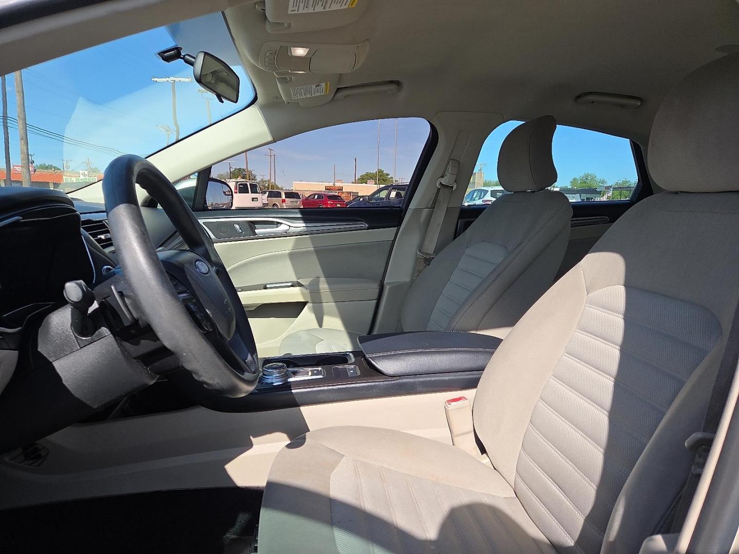 2017 White Gold - GN /Medium Light Stone - DQ Ford Fusion SE (3FA6P0HD9HR) with an EcoBoost 1.5L I-4 gasoline direct injection, DOHC, Ti-VCT variable valve control, intercooled turbo, regular unleaded, engine with 181HP engine, located at 4711 Ave Q, Lubbock, TX, 79412, (806) 687-2362, 33.551304, -101.855293 - Photo#22