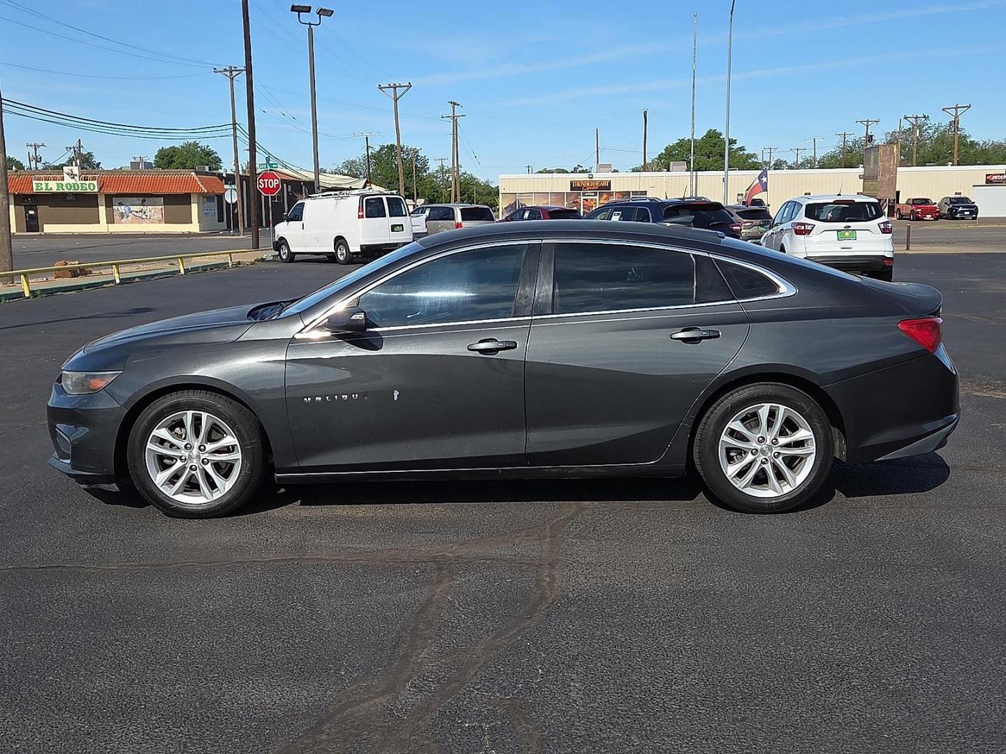 2017 Nightfall Gray Metallic - G7Q /Jet Black - H1T Chevrolet Malibu 1LT (1G1ZE5ST3HF) with an 1.5L I-4 gasoline direct injection, DOHC, variable valve control, intercooled turbo, regular unleaded, engine with 160HP engine, located at 4711 Ave Q, Lubbock, TX, 79412, (806) 687-2362, 33.551304, -101.855293 - Photo#1