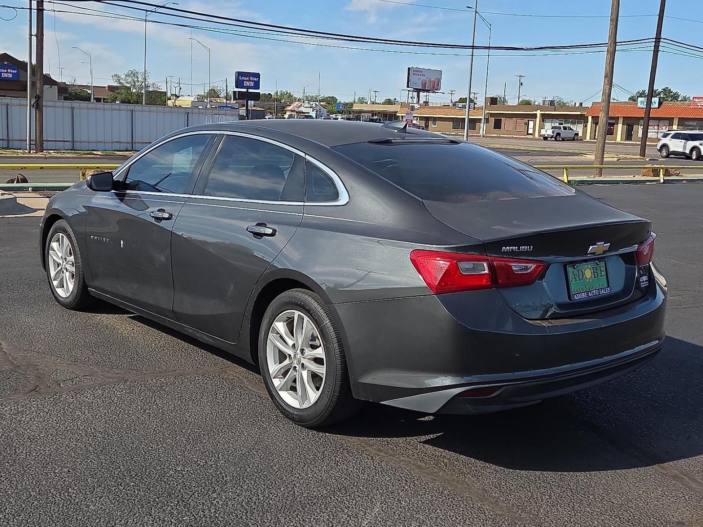 2017 Nightfall Gray Metallic - G7Q /Jet Black - H1T Chevrolet Malibu 1LT (1G1ZE5ST3HF) with an 1.5L I-4 gasoline direct injection, DOHC, variable valve control, intercooled turbo, regular unleaded, engine with 160HP engine, located at 4711 Ave Q, Lubbock, TX, 79412, (806) 687-2362, 33.551304, -101.855293 - Photo#2