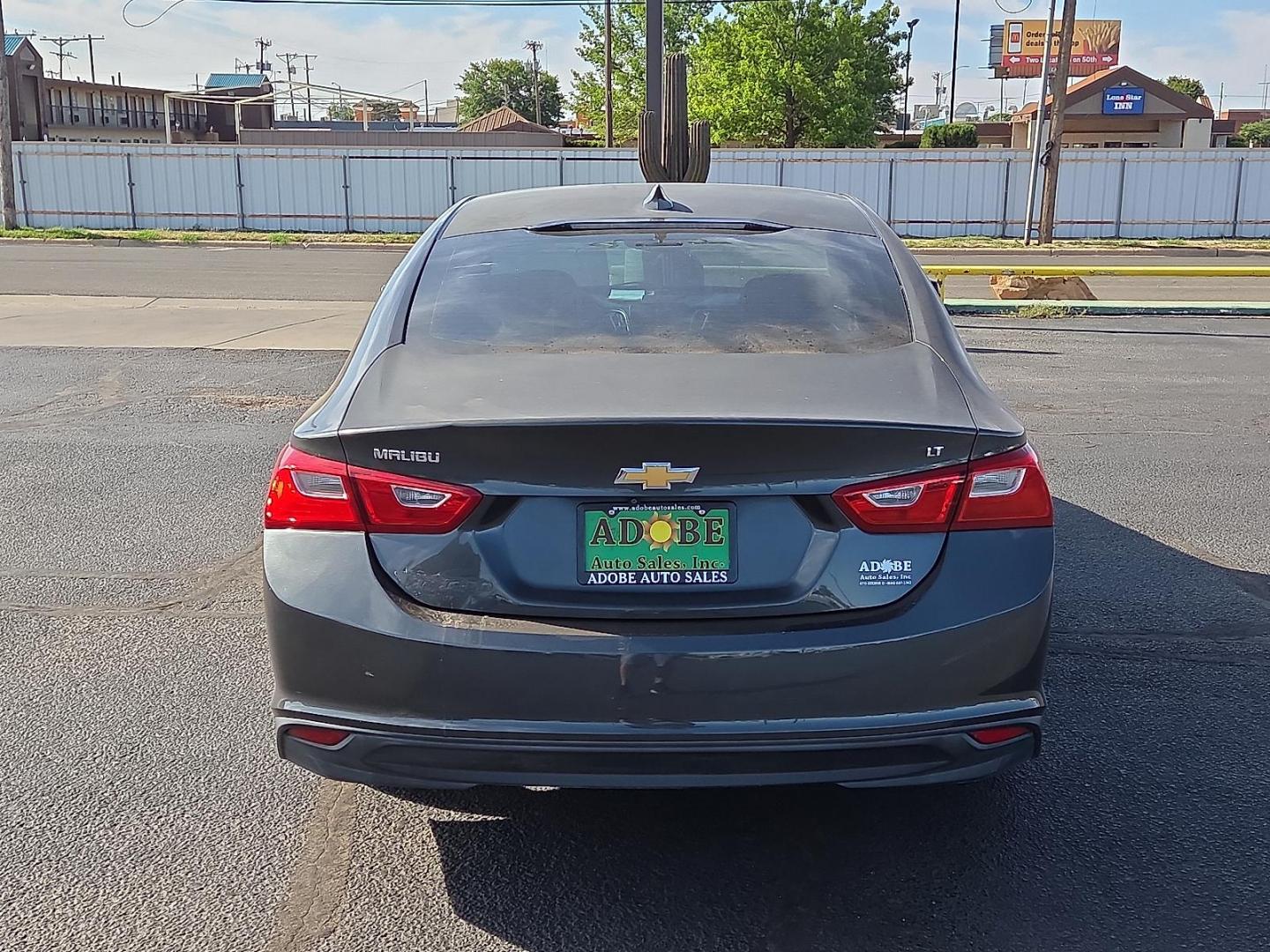 2017 Nightfall Gray Metallic - G7Q /Jet Black - H1T Chevrolet Malibu 1LT (1G1ZE5ST3HF) with an 1.5L I-4 gasoline direct injection, DOHC, variable valve control, intercooled turbo, regular unleaded, engine with 160HP engine, located at 4711 Ave Q, Lubbock, TX, 79412, (806) 687-2362, 33.551304, -101.855293 - Photo#3