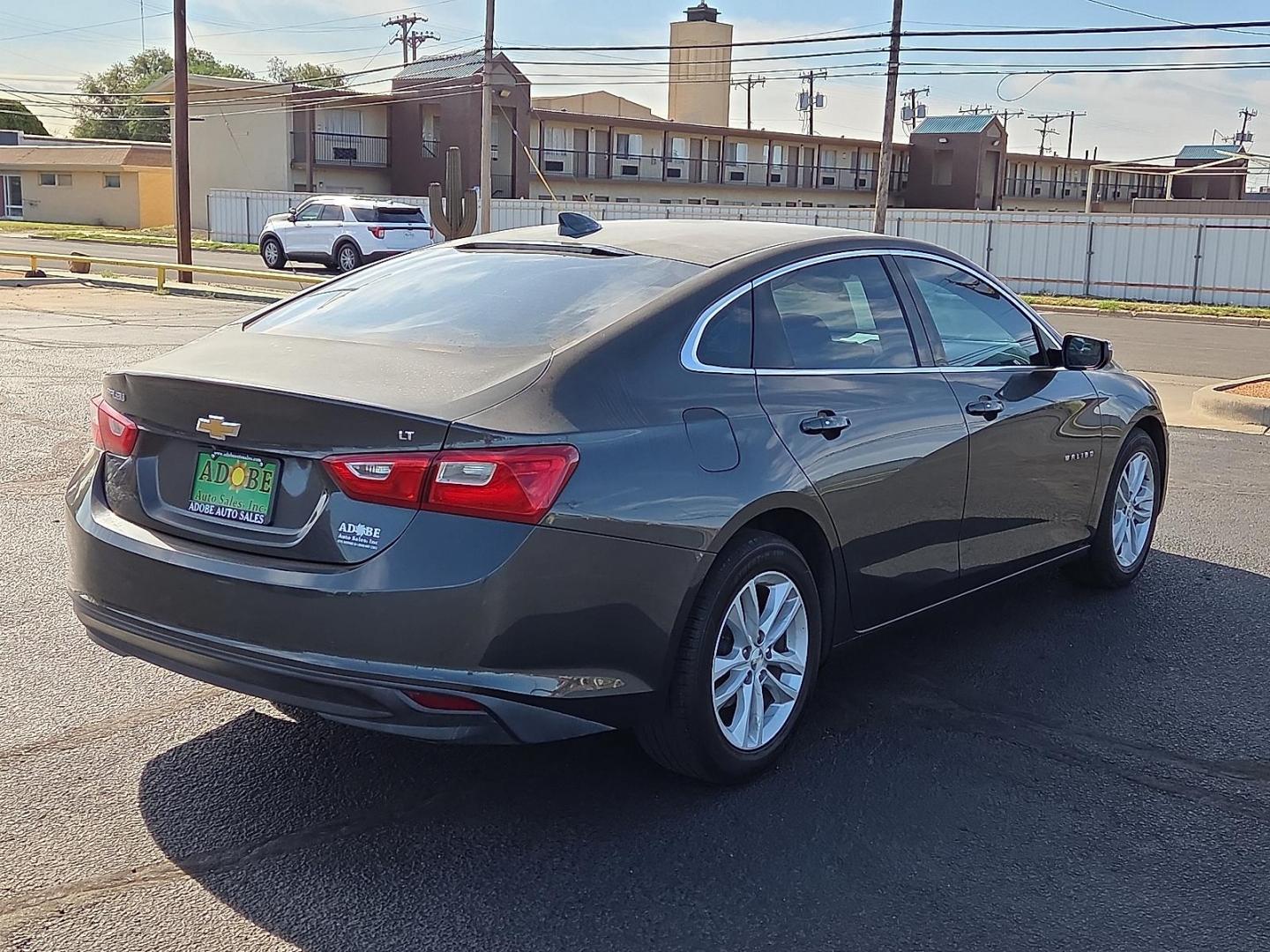 2017 Nightfall Gray Metallic - G7Q /Jet Black - H1T Chevrolet Malibu 1LT (1G1ZE5ST3HF) with an 1.5L I-4 gasoline direct injection, DOHC, variable valve control, intercooled turbo, regular unleaded, engine with 160HP engine, located at 4711 Ave Q, Lubbock, TX, 79412, (806) 687-2362, 33.551304, -101.855293 - Photo#4