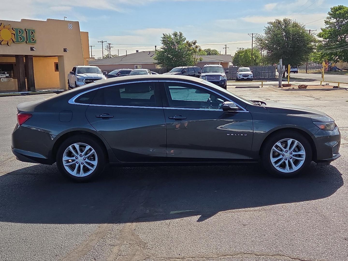 2017 Nightfall Gray Metallic - G7Q /Jet Black - H1T Chevrolet Malibu 1LT (1G1ZE5ST3HF) with an 1.5L I-4 gasoline direct injection, DOHC, variable valve control, intercooled turbo, regular unleaded, engine with 160HP engine, located at 4711 Ave Q, Lubbock, TX, 79412, (806) 687-2362, 33.551304, -101.855293 - Photo#5