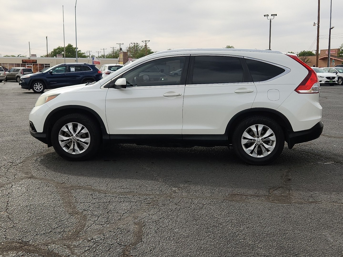2014 WHITE /Beige - BE Honda CR-V EX-L (5J6RM3H71EL) with an 2.4L I-4 DOHC, i-VTEC variable valve control, regular unleaded, engine with 185HP engine, located at 4711 Ave Q, Lubbock, TX, 79412, (806) 687-2362, 33.551304, -101.855293 - Photo#1
