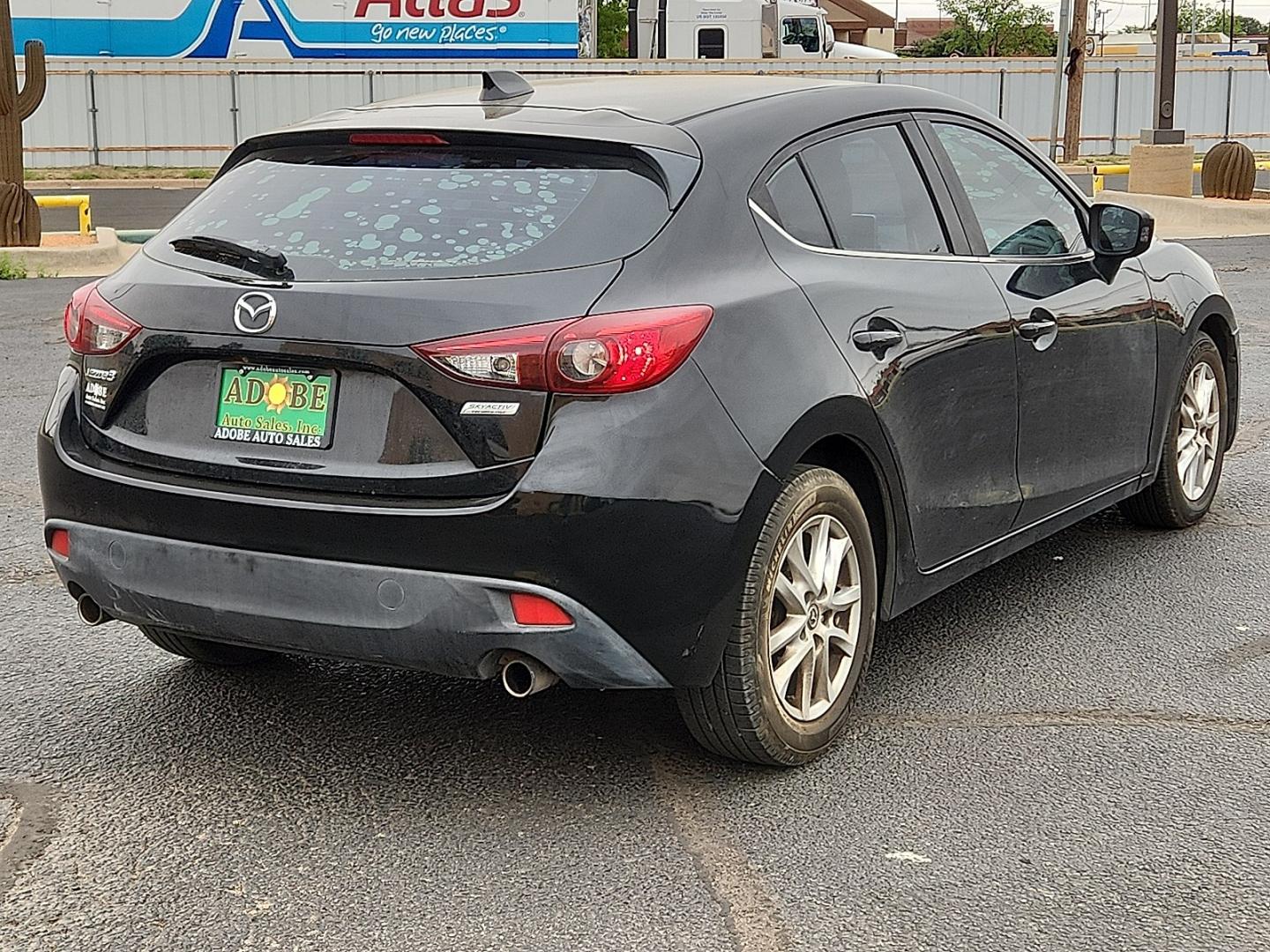 2016 BLACK /Black - BV0 Mazda Mazda3 Hatchback i Grand Touring (3MZBM1N77GM) with an SKYACTIV-G 2L I-4 gasoline direct injection, DOHC, variable valve control, regular unleaded, engine with 155HP engine, located at 4711 Ave Q, Lubbock, TX, 79412, (806) 687-2362, 33.551304, -101.855293 - Photo#3