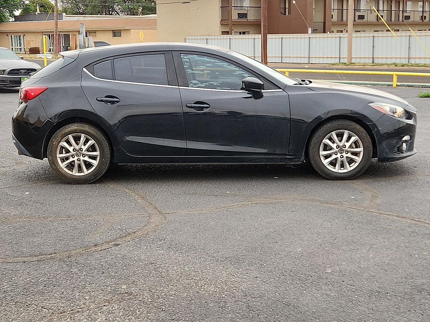 2016 BLACK /Black - BV0 Mazda Mazda3 Hatchback i Grand Touring (3MZBM1N77GM) with an SKYACTIV-G 2L I-4 gasoline direct injection, DOHC, variable valve control, regular unleaded, engine with 155HP engine, located at 4711 Ave Q, Lubbock, TX, 79412, (806) 687-2362, 33.551304, -101.855293 - Photo#4