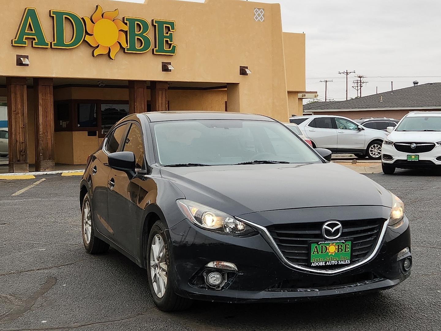 2016 BLACK /Black - BV0 Mazda Mazda3 Hatchback i Grand Touring (3MZBM1N77GM) with an SKYACTIV-G 2L I-4 gasoline direct injection, DOHC, variable valve control, regular unleaded, engine with 155HP engine, located at 4711 Ave Q, Lubbock, TX, 79412, (806) 687-2362, 33.551304, -101.855293 - Photo#5