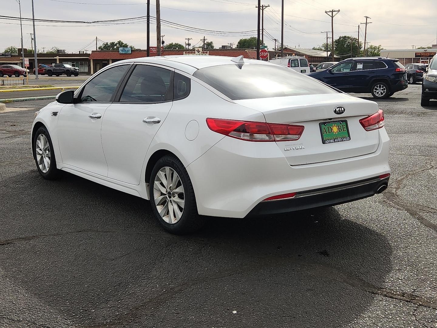 2016 WHITE /Beige - BHH Kia Optima LX (5XXGT4L3XGG) with an Theta II 2.4L I-4 gasoline direct injection, DOHC, CVVT variable valve control, regular unleaded, engine with 185HP engine, located at 4711 Ave Q, Lubbock, TX, 79412, (806) 687-2362, 33.551304, -101.855293 - Photo#2