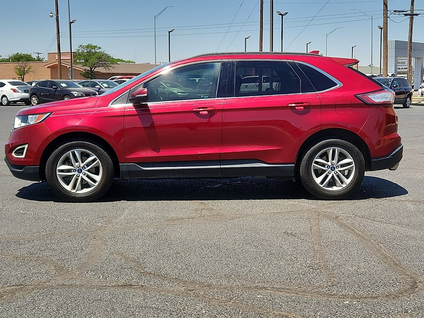 2016 RED /Ebony - LE Ford Edge SEL (2FMPK3J81GB) with an 3.5L V-6 DOHC, variable valve control, regular unleaded, engine with 280HP engine, located at 4711 Ave Q, Lubbock, TX, 79412, (806) 687-2362, 33.551304, -101.855293 - Photo#1