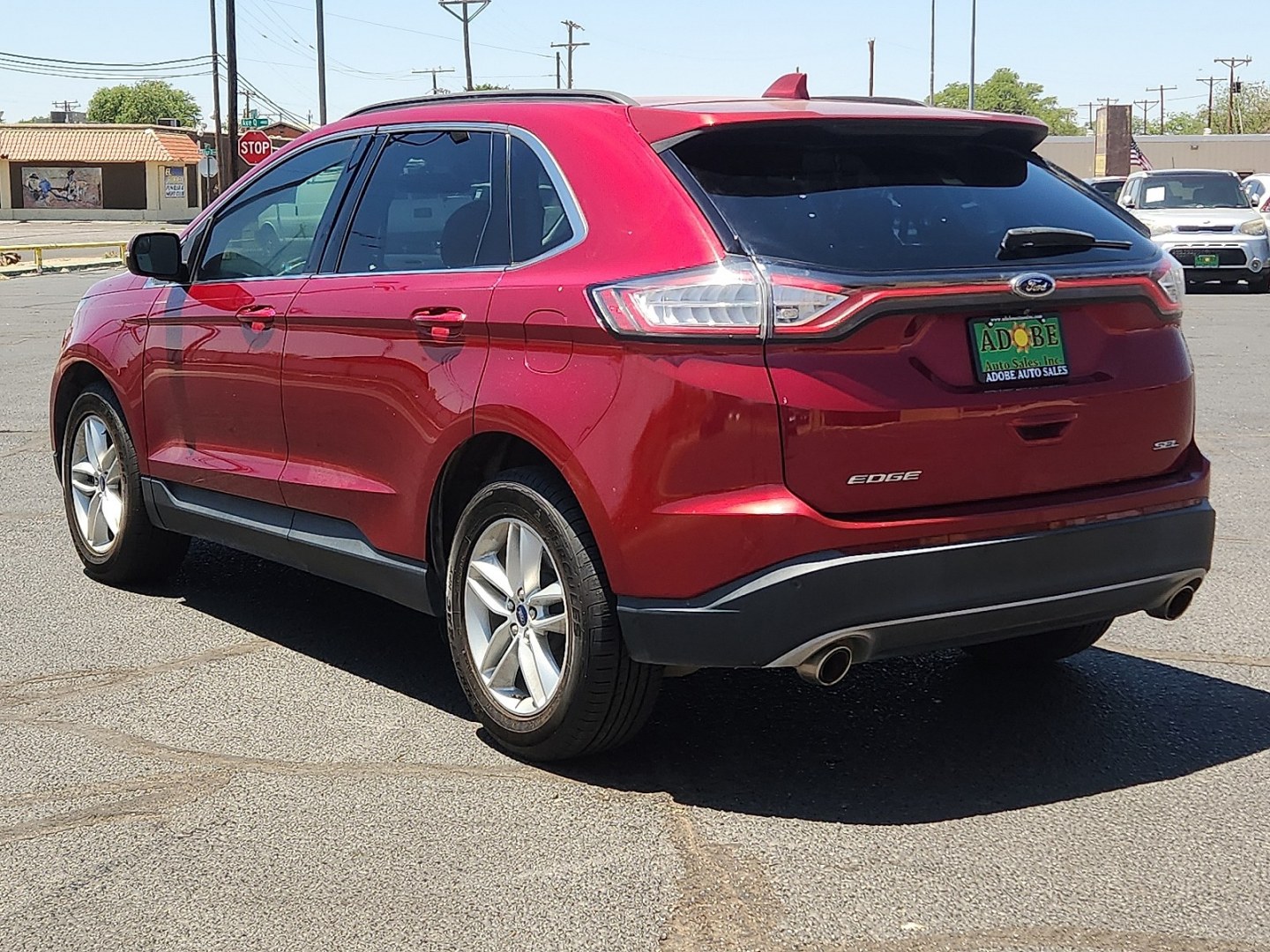 2016 RED /Ebony - LE Ford Edge SEL (2FMPK3J81GB) with an 3.5L V-6 DOHC, variable valve control, regular unleaded, engine with 280HP engine, located at 4711 Ave Q, Lubbock, TX, 79412, (806) 687-2362, 33.551304, -101.855293 - Photo#2