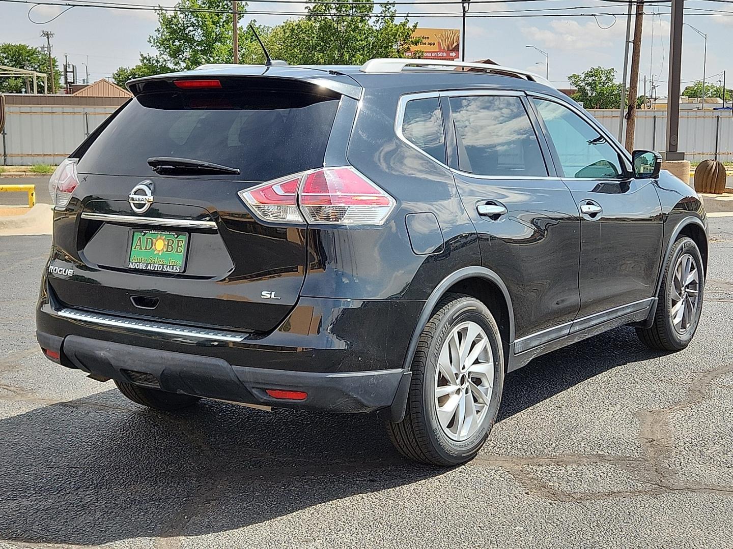 2016 BLACK /Charcoal - G Nissan Rogue SL (5N1AT2MT4GC) with an 2.5L I-4 DOHC, variable valve control, regular unleaded, engine with 170HP engine, located at 4711 Ave Q, Lubbock, TX, 79412, (806) 687-2362, 33.551304, -101.855293- Photo#3