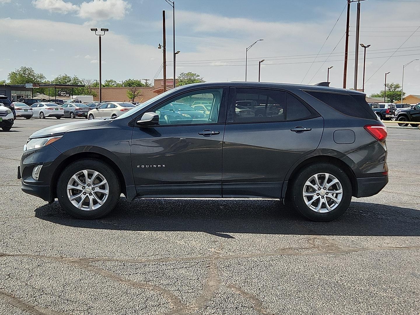 2019 GRAY /Medium Ash Gray - H72 Chevrolet Equinox LS (3GNAXHEV0KL) with an 1.5L I-4 gasoline direct injection, DOHC, VVT variable valve control, intercooled turbo, regular unleaded, engine with 170HP engine, located at 4711 Ave Q, Lubbock, TX, 79412, (806) 687-2362, 33.551304, -101.855293 - Photo#1