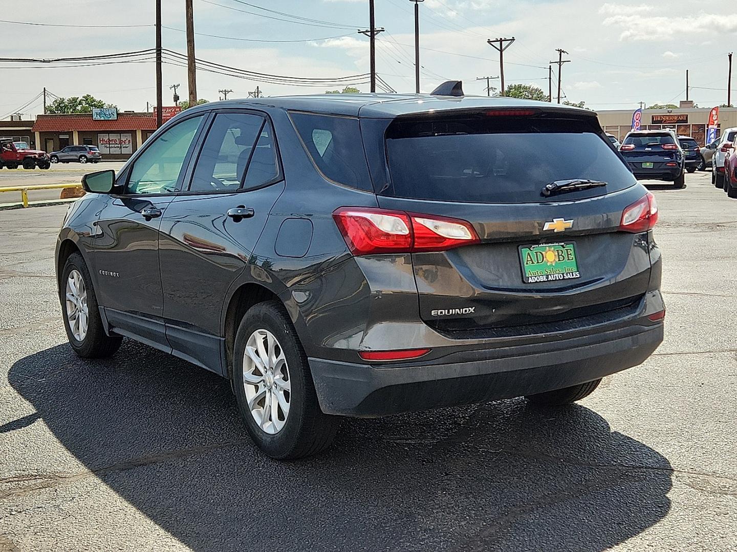 2019 GRAY /Medium Ash Gray - H72 Chevrolet Equinox LS (3GNAXHEV0KL) with an 1.5L I-4 gasoline direct injection, DOHC, VVT variable valve control, intercooled turbo, regular unleaded, engine with 170HP engine, located at 4711 Ave Q, Lubbock, TX, 79412, (806) 687-2362, 33.551304, -101.855293 - Photo#2