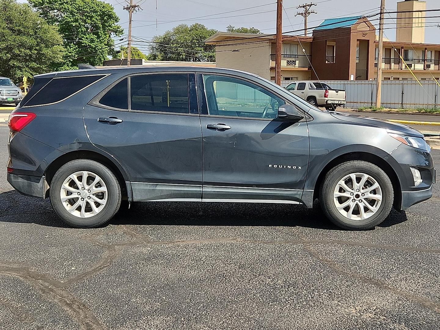 2019 GRAY /Medium Ash Gray - H72 Chevrolet Equinox LS (3GNAXHEV0KL) with an 1.5L I-4 gasoline direct injection, DOHC, VVT variable valve control, intercooled turbo, regular unleaded, engine with 170HP engine, located at 4711 Ave Q, Lubbock, TX, 79412, (806) 687-2362, 33.551304, -101.855293 - Photo#4