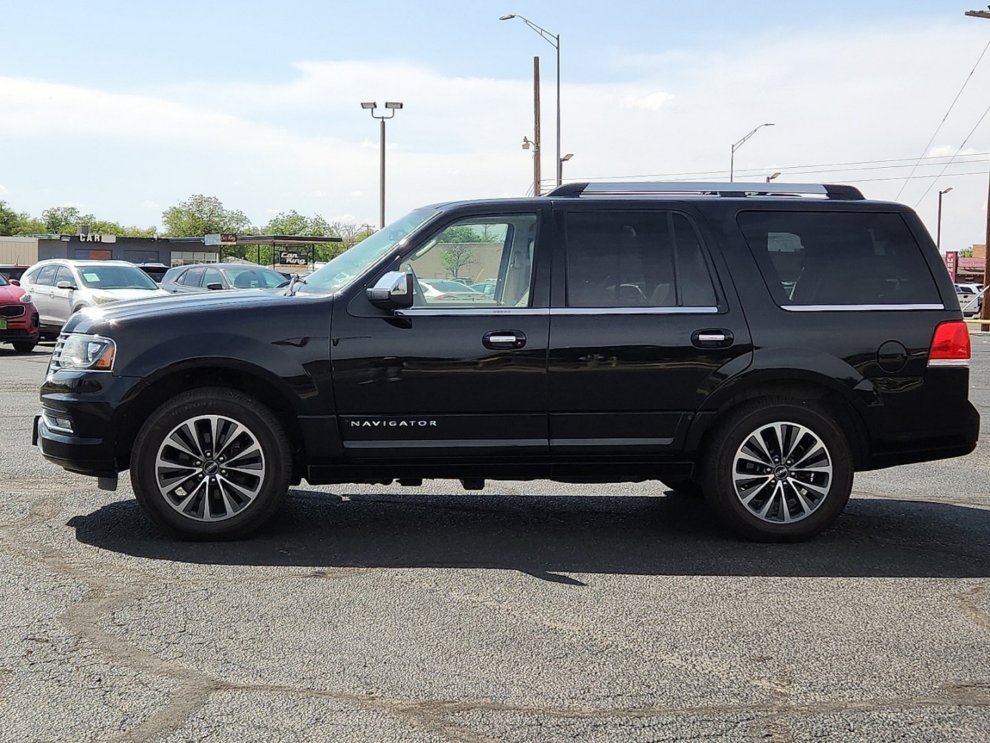 2016 BLACK /Medium Light Stone - PL Lincoln Navigator Select (5LMJJ2JT5GE) with an EcoBoost 3.5L V-6 gasoline direct injection, DOHC, variable valve control, twin turbo, premium unleaded, engine with 380HP engine, located at 4711 Ave Q, Lubbock, TX, 79412, (806) 687-2362, 33.551304, -101.855293- Photo#1