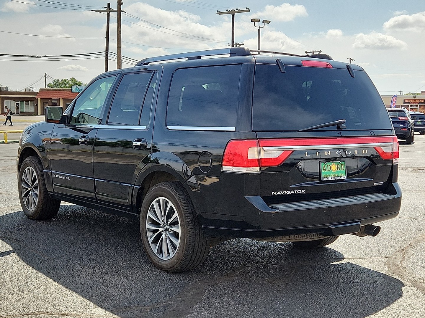 2016 BLACK /Medium Light Stone - PL Lincoln Navigator Select (5LMJJ2JT5GE) with an EcoBoost 3.5L V-6 gasoline direct injection, DOHC, variable valve control, twin turbo, premium unleaded, engine with 380HP engine, located at 4711 Ave Q, Lubbock, TX, 79412, (806) 687-2362, 33.551304, -101.855293- Photo#2