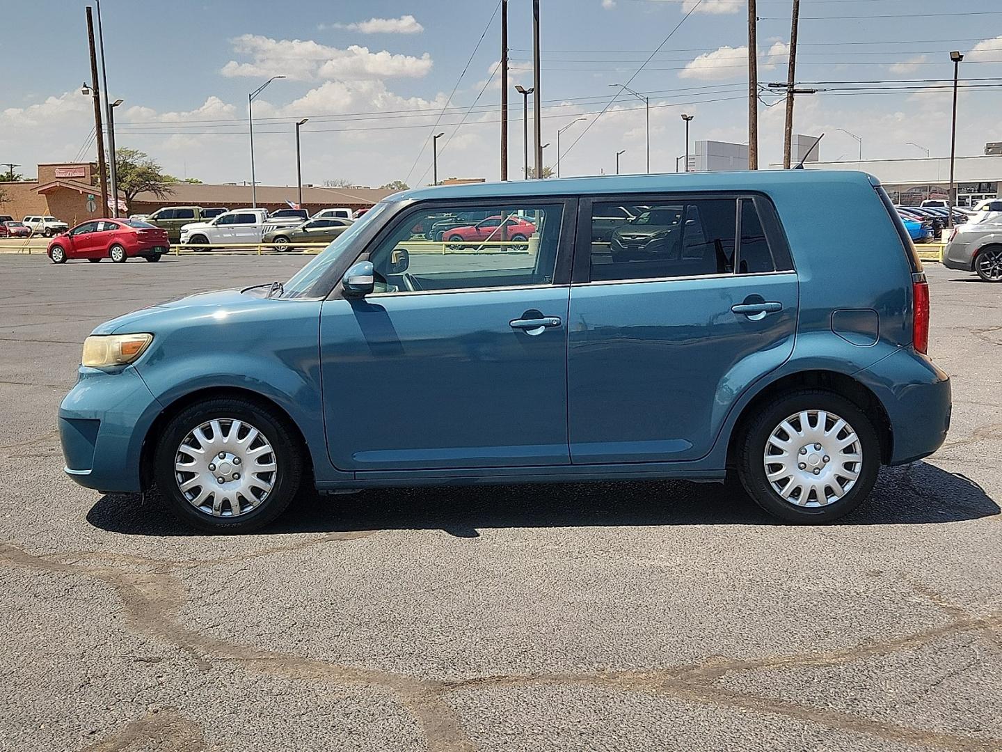 2008 GREEN /Dark Gray - 10 Scion xB (JTLKE50E881) with an 2.4L I-4 DOHC, variable valve control, regular unleaded, engine with 158HP engine, located at 4711 Ave Q, Lubbock, TX, 79412, (806) 687-2362, 33.551304, -101.855293- Photo#1