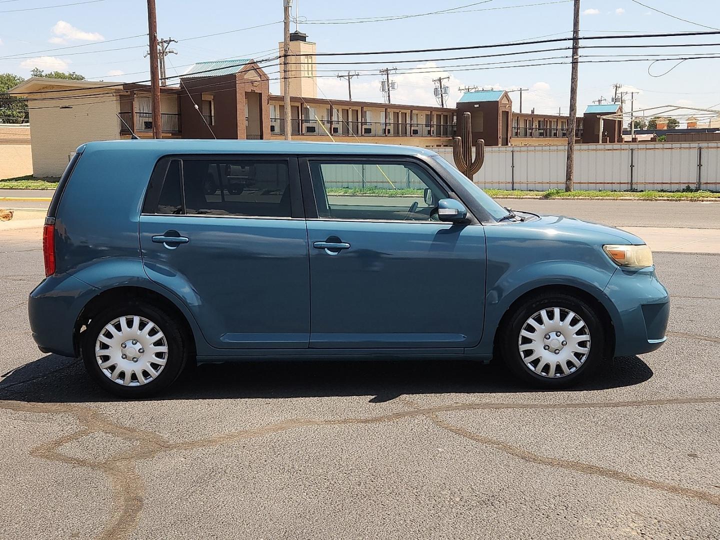 2008 GREEN /Dark Gray - 10 Scion xB (JTLKE50E881) with an 2.4L I-4 DOHC, variable valve control, regular unleaded, engine with 158HP engine, located at 4711 Ave Q, Lubbock, TX, 79412, (806) 687-2362, 33.551304, -101.855293- Photo#4