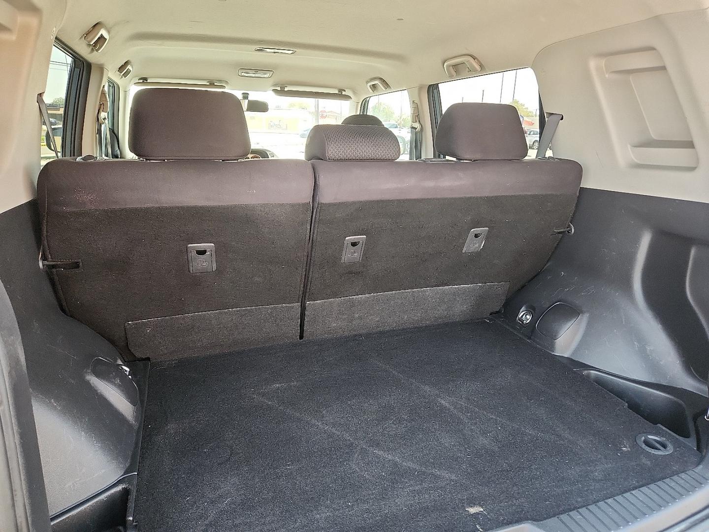 2008 GREEN /Dark Gray - 10 Scion xB (JTLKE50E881) with an 2.4L I-4 DOHC, variable valve control, regular unleaded, engine with 158HP engine, located at 4711 Ave Q, Lubbock, TX, 79412, (806) 687-2362, 33.551304, -101.855293- Photo#7
