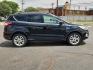 2018 BLACK /Medium Light Stone - KL Ford Escape SE (1FMCU0G9XJU) with an EcoBoost 2L I-4 gasoline direct injection, DOHC, variable valve control, intercooled turbo, premium unleaded, engine with 245HP engine, located at 4711 Ave Q, Lubbock, TX, 79412, (806) 687-2362, 33.551304, -101.855293- Photo#4