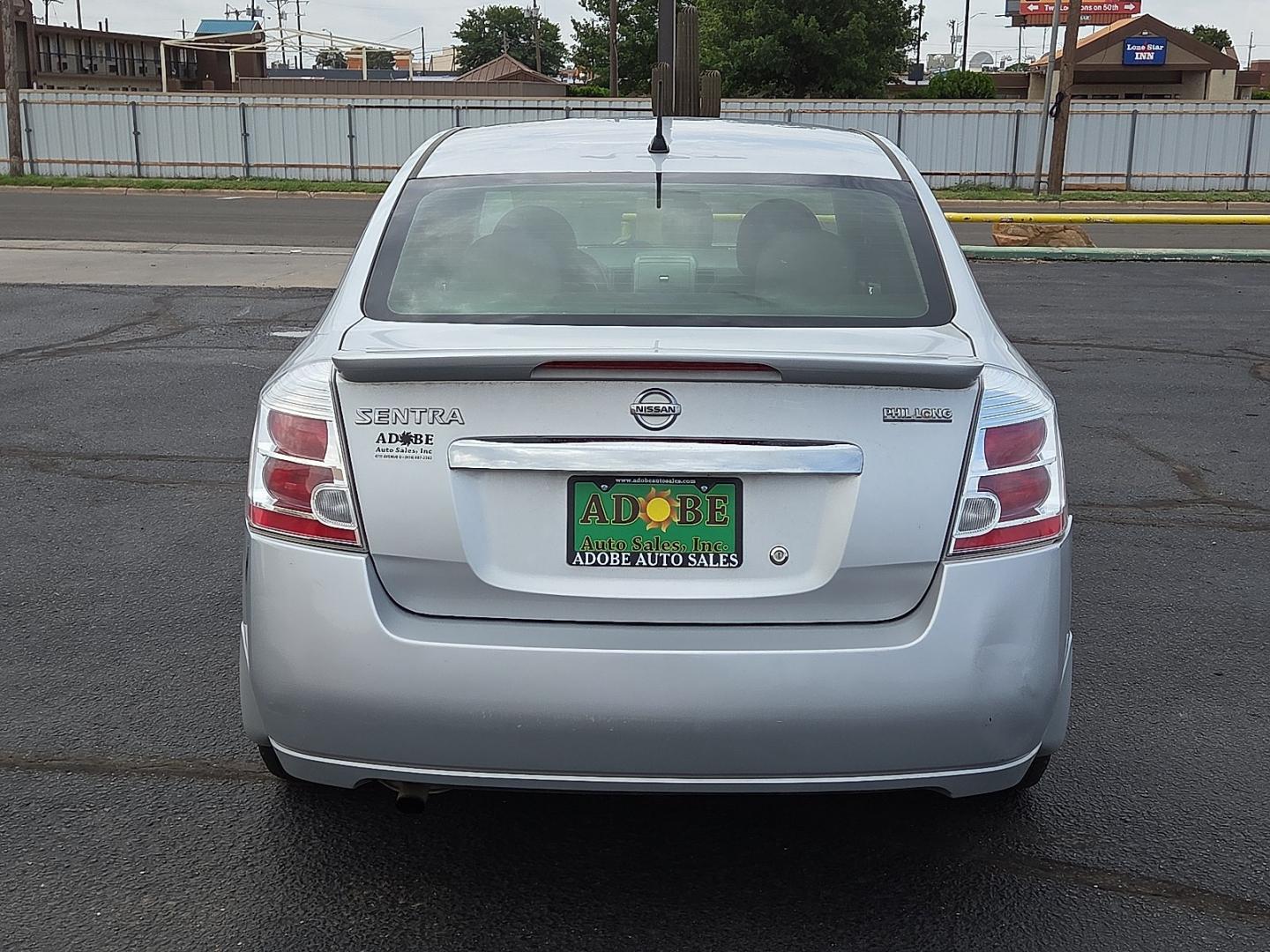2012 Brilliant Silver - K23 /Gray Nissan Sentra 2.0 S (3N1AB6AP9CL) with an 2L I-4 DOHC, variable valve control, regular unleaded, engine with 140HP engine, located at 4711 Ave Q, Lubbock, TX, 79412, (806) 687-2362, 33.551304, -101.855293- Photo#3