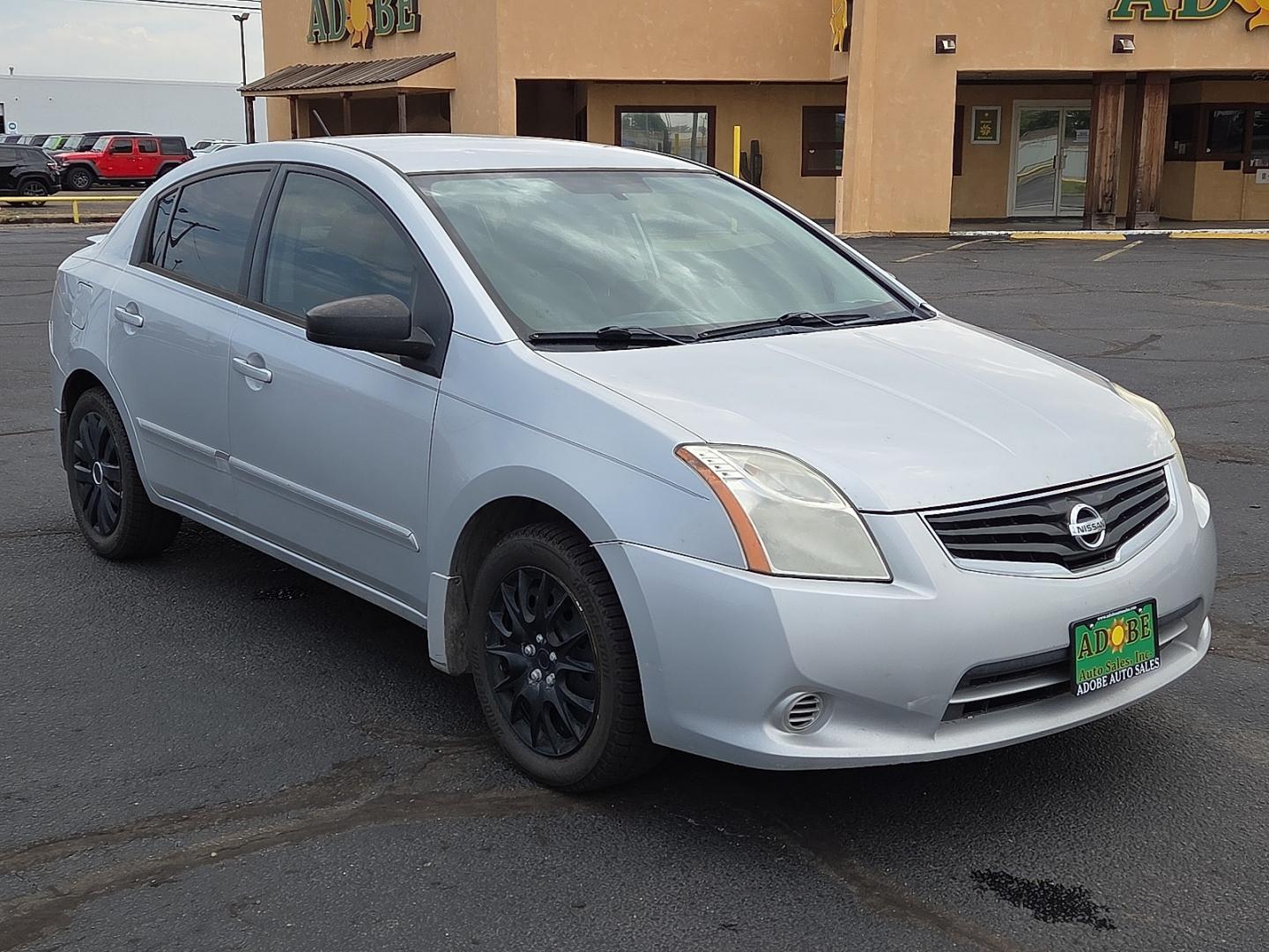 2012 Brilliant Silver - K23 /Gray Nissan Sentra 2.0 S (3N1AB6AP9CL) with an 2L I-4 DOHC, variable valve control, regular unleaded, engine with 140HP engine, located at 4711 Ave Q, Lubbock, TX, 79412, (806) 687-2362, 33.551304, -101.855293- Photo#6