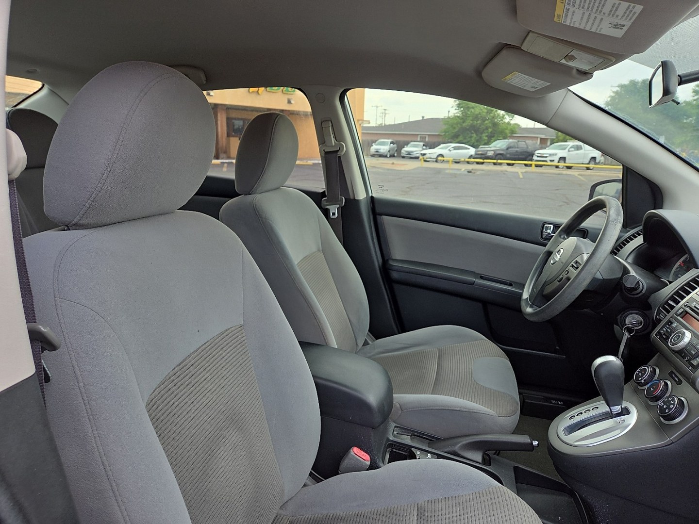 2012 Brilliant Silver - K23 /Gray Nissan Sentra 2.0 S (3N1AB6AP9CL) with an 2L I-4 DOHC, variable valve control, regular unleaded, engine with 140HP engine, located at 4711 Ave Q, Lubbock, TX, 79412, (806) 687-2362, 33.551304, -101.855293- Photo#10