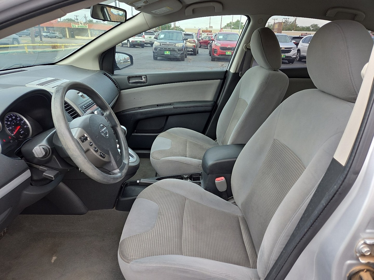 2012 Brilliant Silver - K23 /Gray Nissan Sentra 2.0 S (3N1AB6AP9CL) with an 2L I-4 DOHC, variable valve control, regular unleaded, engine with 140HP engine, located at 4711 Ave Q, Lubbock, TX, 79412, (806) 687-2362, 33.551304, -101.855293- Photo#19