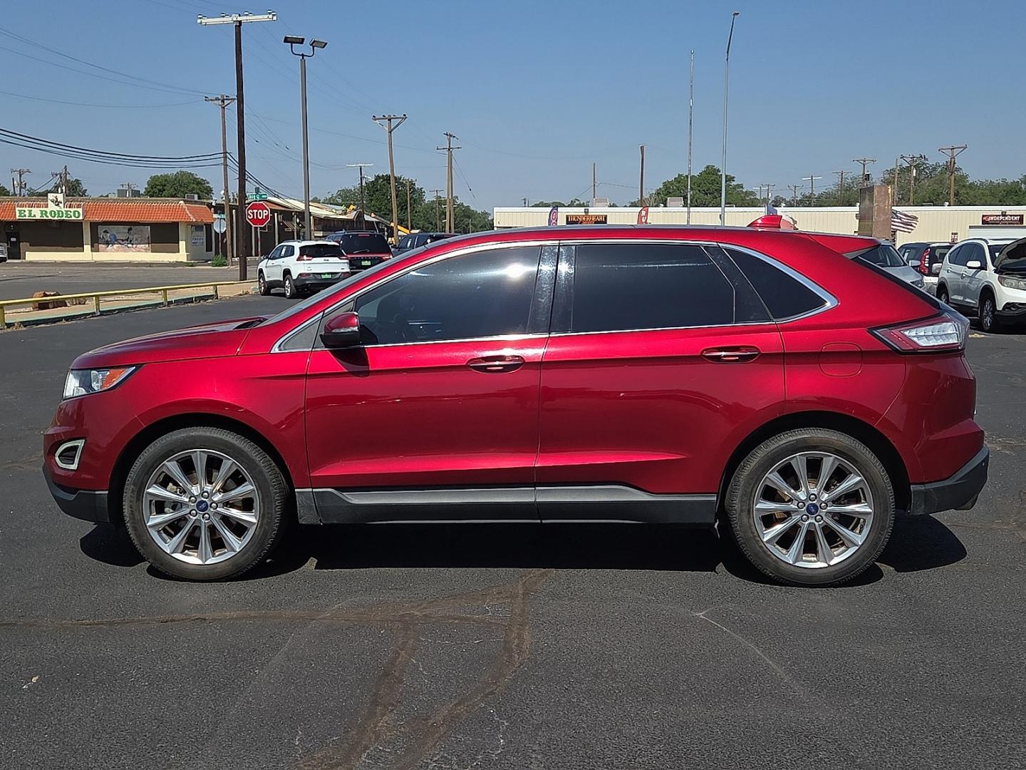 2018 Ruby Red Metallic Tinted Clearcoat - RR /Ebony - PE Ford Edge Titanium (2FMPK3K85JB) with an 3.5L V-6 DOHC, variable valve control, regular unleaded, engine with 280HP engine, located at 4711 Ave Q, Lubbock, TX, 79412, (806) 687-2362, 33.551304, -101.855293- Photo#1
