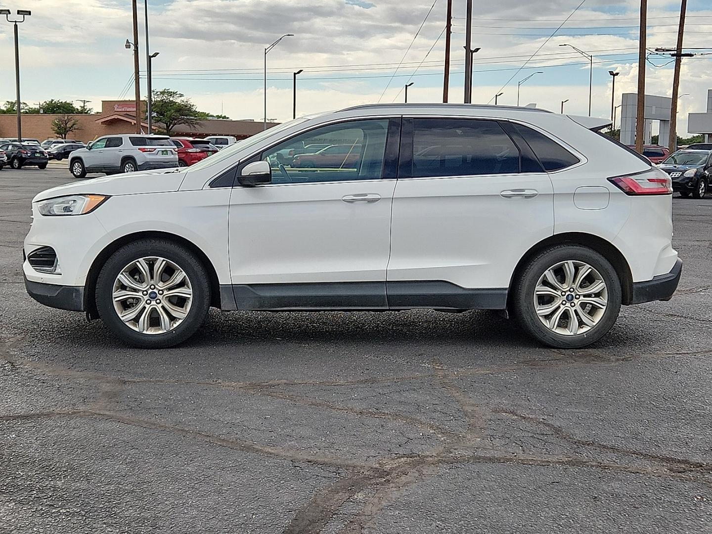 2020 WHITE /Soft Ceramic - LC Ford Edge Titanium (2FMPK3K9XLB) with an EcoBoost 2L I-4 gasoline direct injection, DOHC, variable valve control, intercooled turbo, premium unleaded, engine with 250HP engine, located at 4711 Ave Q, Lubbock, TX, 79412, (806) 687-2362, 33.551304, -101.855293- Photo#1