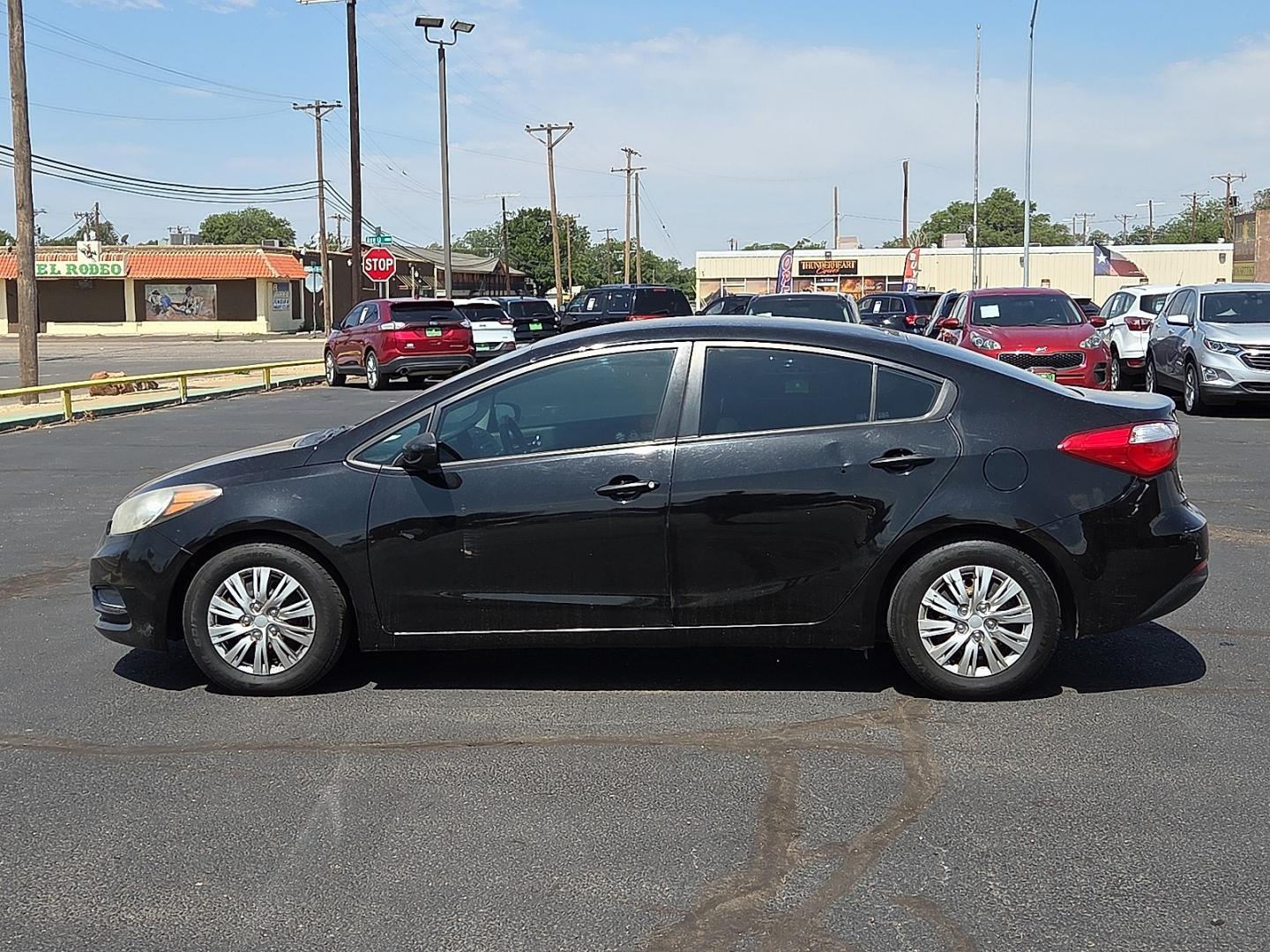 2016 Aurora Black Pearl - ABP /Gray - DFR Kia Forte LX (KNAFK4A63G5) with an 1.8L I-4 DOHC, D-CVVT variable valve control, regular unleaded, engine with 145HP engine, located at 4711 Ave Q, Lubbock, TX, 79412, (806) 687-2362, 33.551304, -101.855293- Photo#1