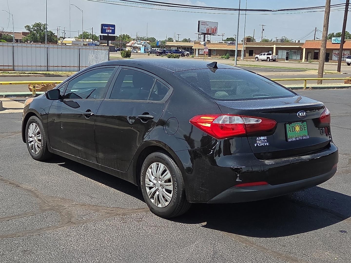 2016 Aurora Black Pearl - ABP /Gray - DFR Kia Forte LX (KNAFK4A63G5) with an 1.8L I-4 DOHC, D-CVVT variable valve control, regular unleaded, engine with 145HP engine, located at 4711 Ave Q, Lubbock, TX, 79412, (806) 687-2362, 33.551304, -101.855293- Photo#2