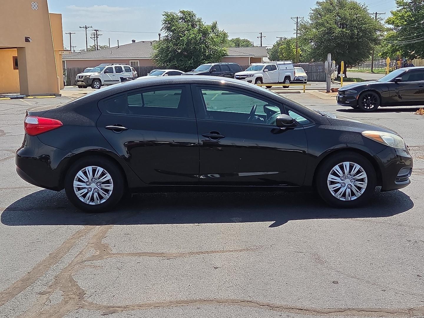 2016 Aurora Black Pearl - ABP /Gray - DFR Kia Forte LX (KNAFK4A63G5) with an 1.8L I-4 DOHC, D-CVVT variable valve control, regular unleaded, engine with 145HP engine, located at 4711 Ave Q, Lubbock, TX, 79412, (806) 687-2362, 33.551304, -101.855293- Photo#5