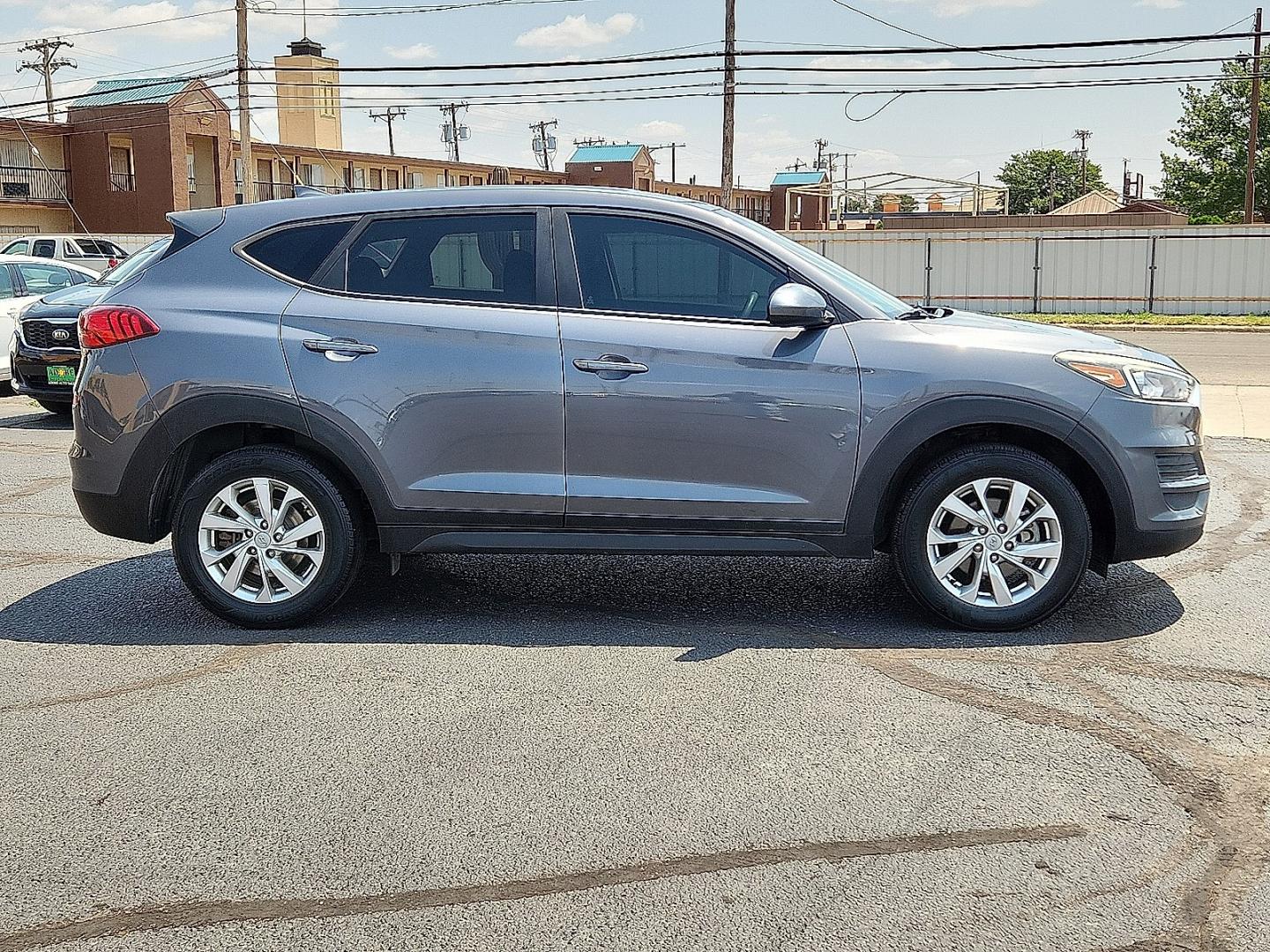2019 GRAY /Black - TRY Hyundai Tucson SE (KM8J23A48KU) with an Nu 2L I-4 gasoline direct injection, DOHC, D-CVVT variable valve control, regular unleaded, engine with 161HP engine, located at 4711 Ave Q, Lubbock, TX, 79412, (806) 687-2362, 33.551304, -101.855293- Photo#4