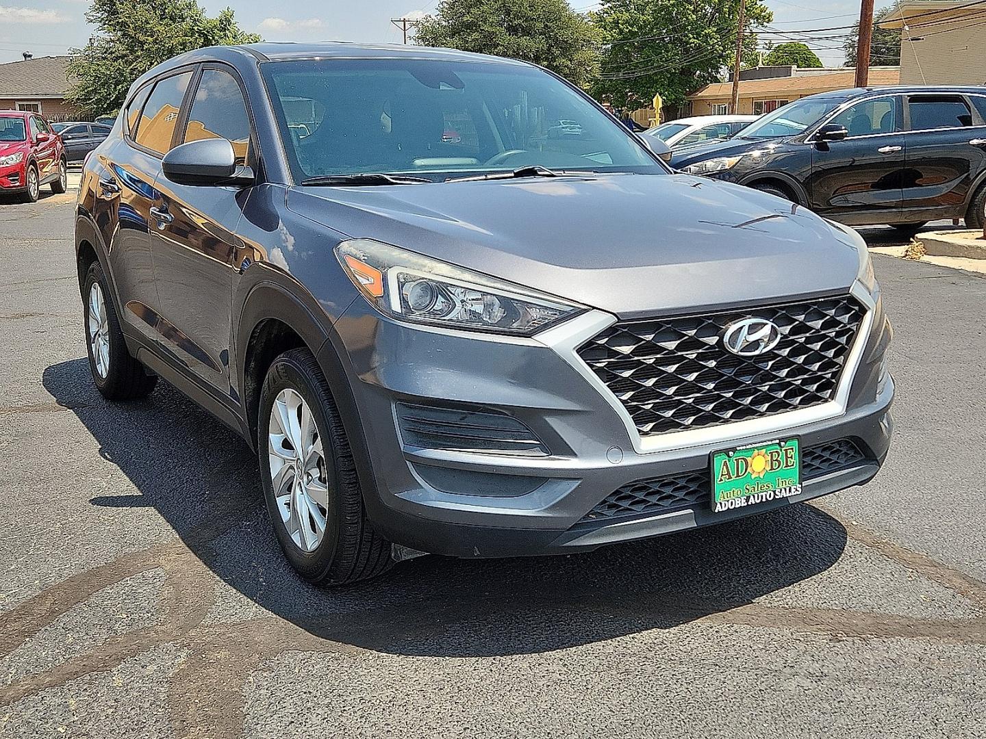 2019 GRAY /Black - TRY Hyundai Tucson SE (KM8J23A48KU) with an Nu 2L I-4 gasoline direct injection, DOHC, D-CVVT variable valve control, regular unleaded, engine with 161HP engine, located at 4711 Ave Q, Lubbock, TX, 79412, (806) 687-2362, 33.551304, -101.855293- Photo#5