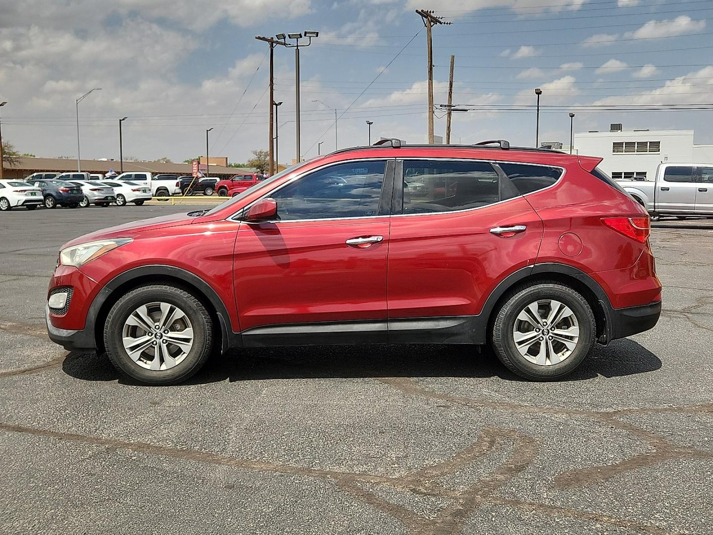 2014 RED Hyundai Santa Fe Sport 2.4L (5XYZU3LB9EG) with an Theta II 2.4L I-4 gasoline direct injection, DOHC, variable valve control, regular unleaded, engine with 190HP engine, located at 4711 Ave Q, Lubbock, TX, 79412, (806) 687-2362, 33.551304, -101.855293- Photo#1