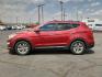 2014 RED Hyundai Santa Fe Sport 2.4L (5XYZU3LB9EG) with an Theta II 2.4L I-4 gasoline direct injection, DOHC, variable valve control, regular unleaded, engine with 190HP engine, located at 4711 Ave Q, Lubbock, TX, 79412, (806) 687-2362, 33.551304, -101.855293- Photo#1